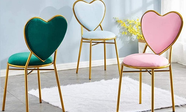 three heart-shaped desk chairs